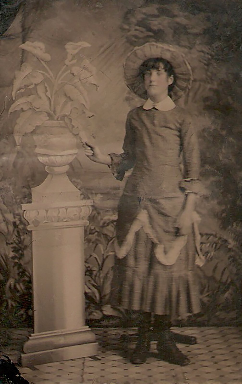 A photo of Elizabeth O'Brien produced on tin. Taken in 1887 when she was 16 years old.