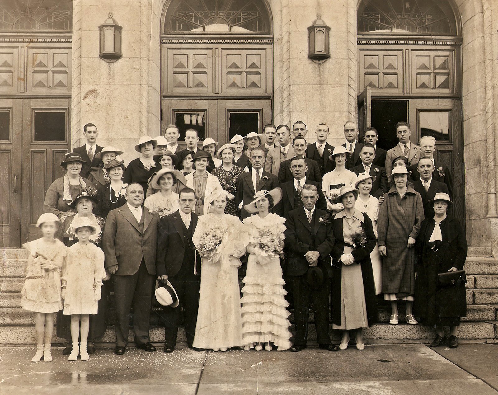 Wedding photo on the steps of St. Willibrord’s Church in Verdun, Quebec. Taken 15 August 1936 on the occasion of the marriage of Joseph Quinn to Mary Florence Dennison