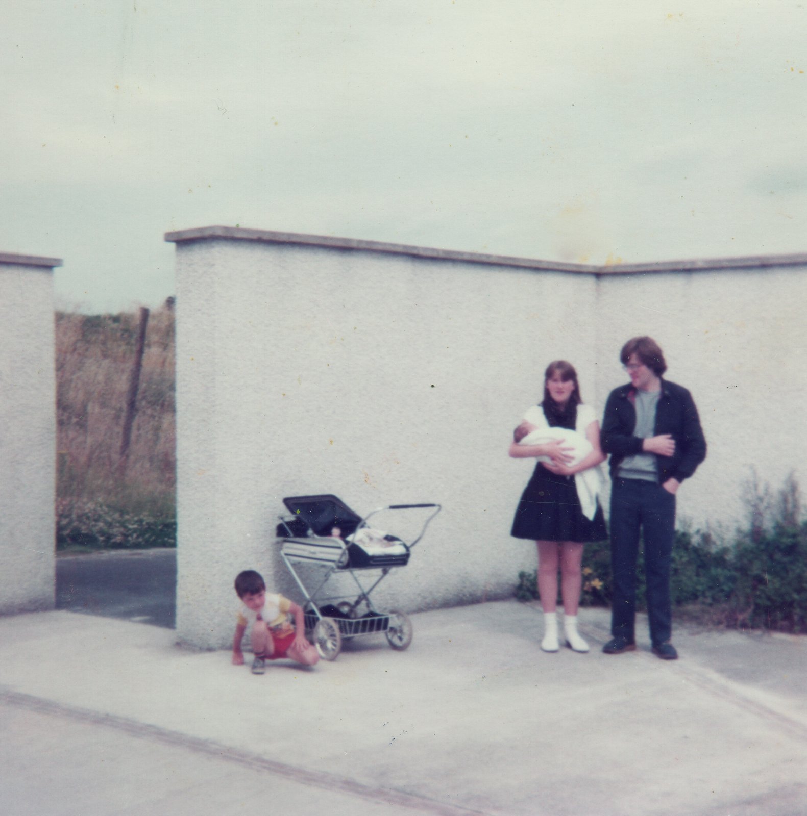 Siobhán Murphy holds niece and God daughter Lisa in 1982. Also pictured are Marty McKieran and Kevin Crowne.