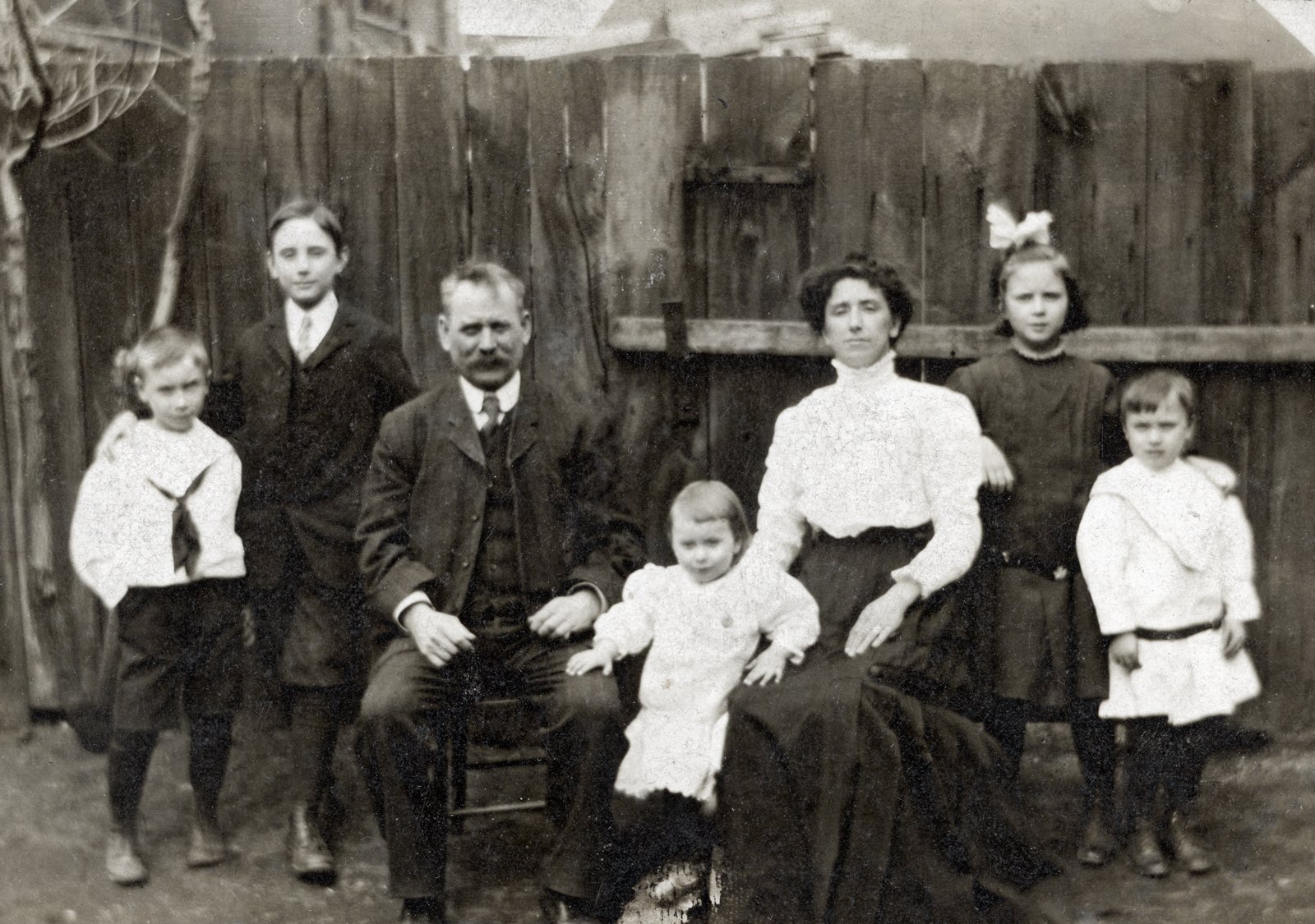 A portrait of the Shea family taken in their backyard in the St. Henri neighbourhood of Montreal, c. 1910.