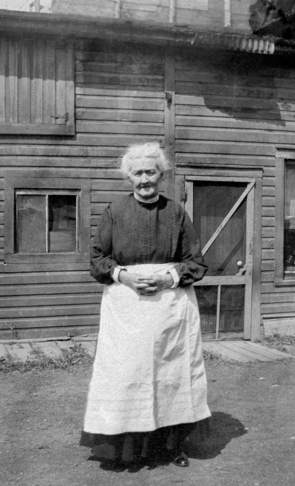 Mary Meagher on the Meagher family farm in Marysville, Tyendinaga Township, Hastings County, Ontario, mid 1910s.